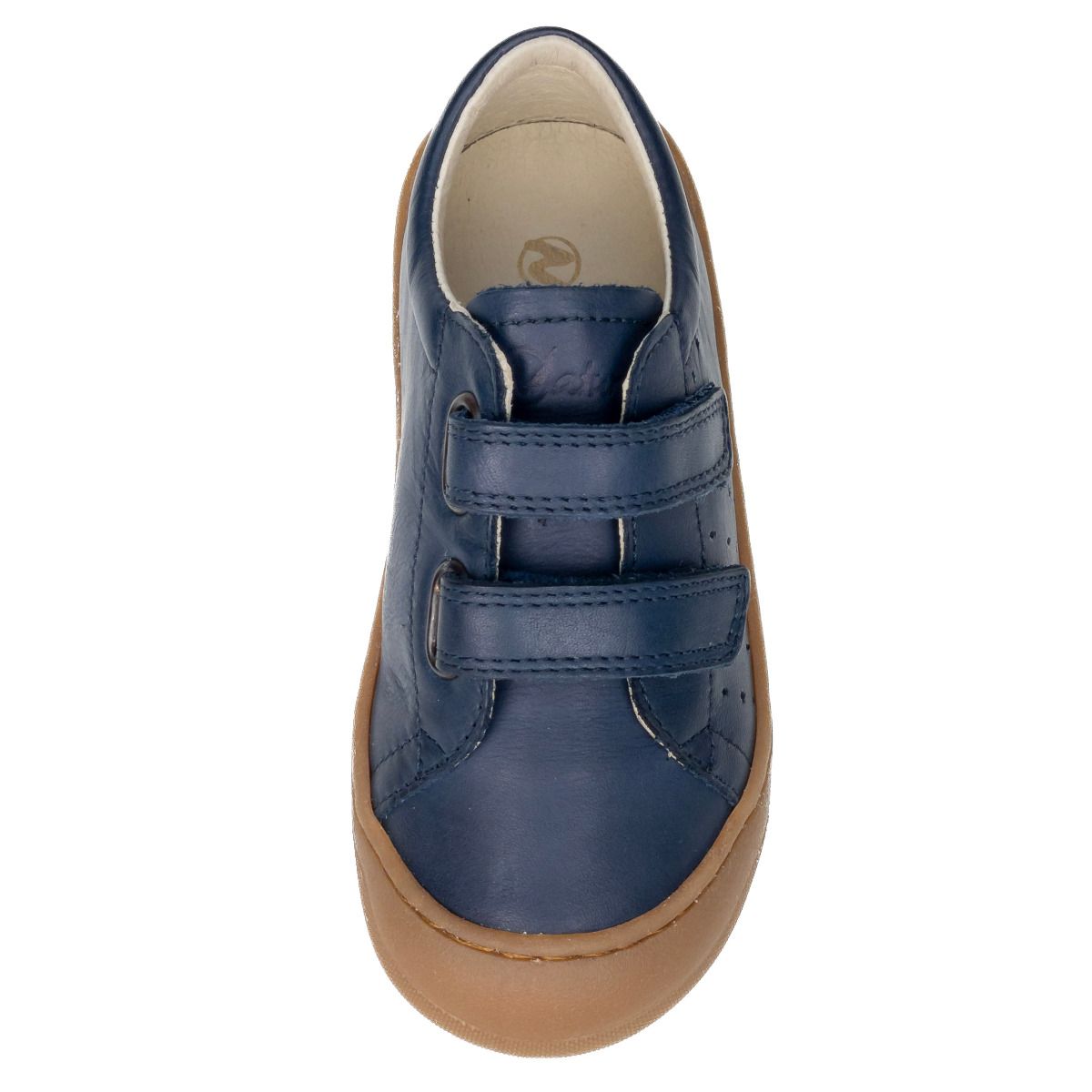 Young child wearing NATURINO Halbschuh GABBY in navy and celeste walking on pavement