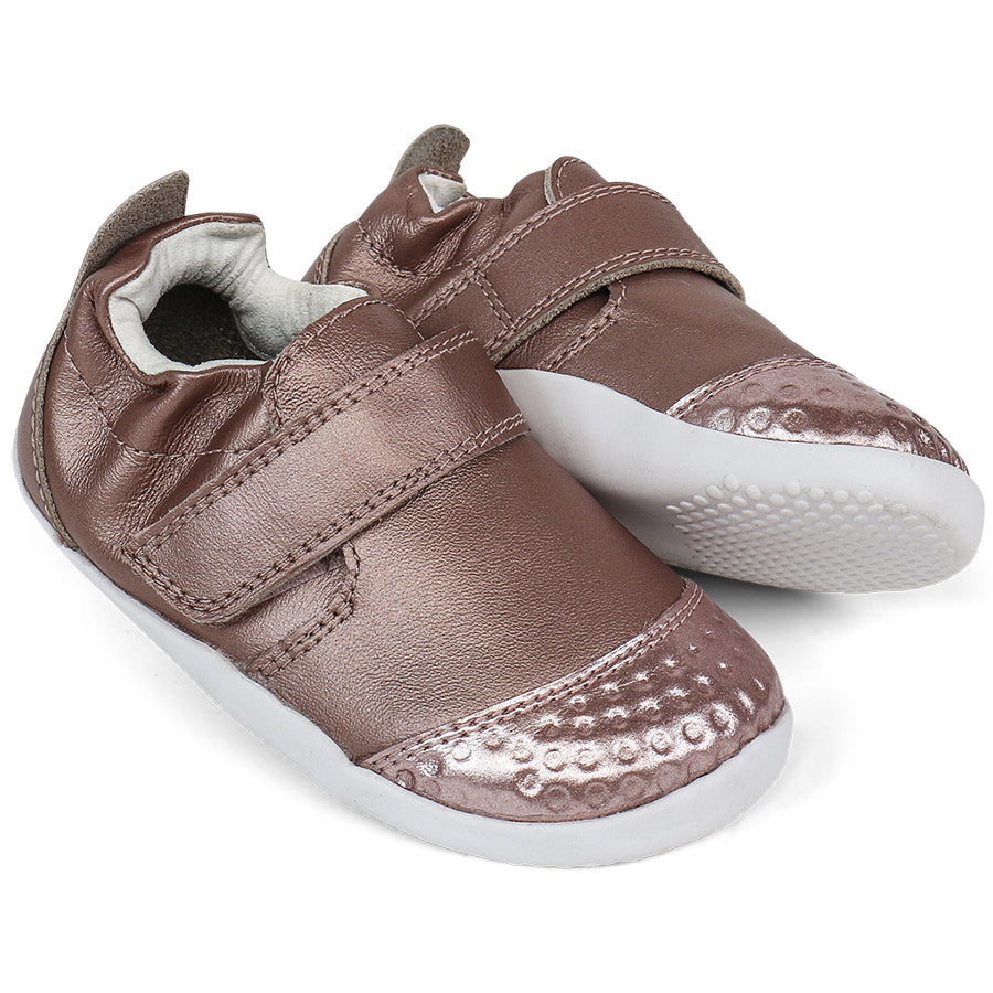 A close-up image of the BOBUX PreWalker XP GO 501015B in roségold, showcasing its stylish design and durable construction for young toddlers learning to walk