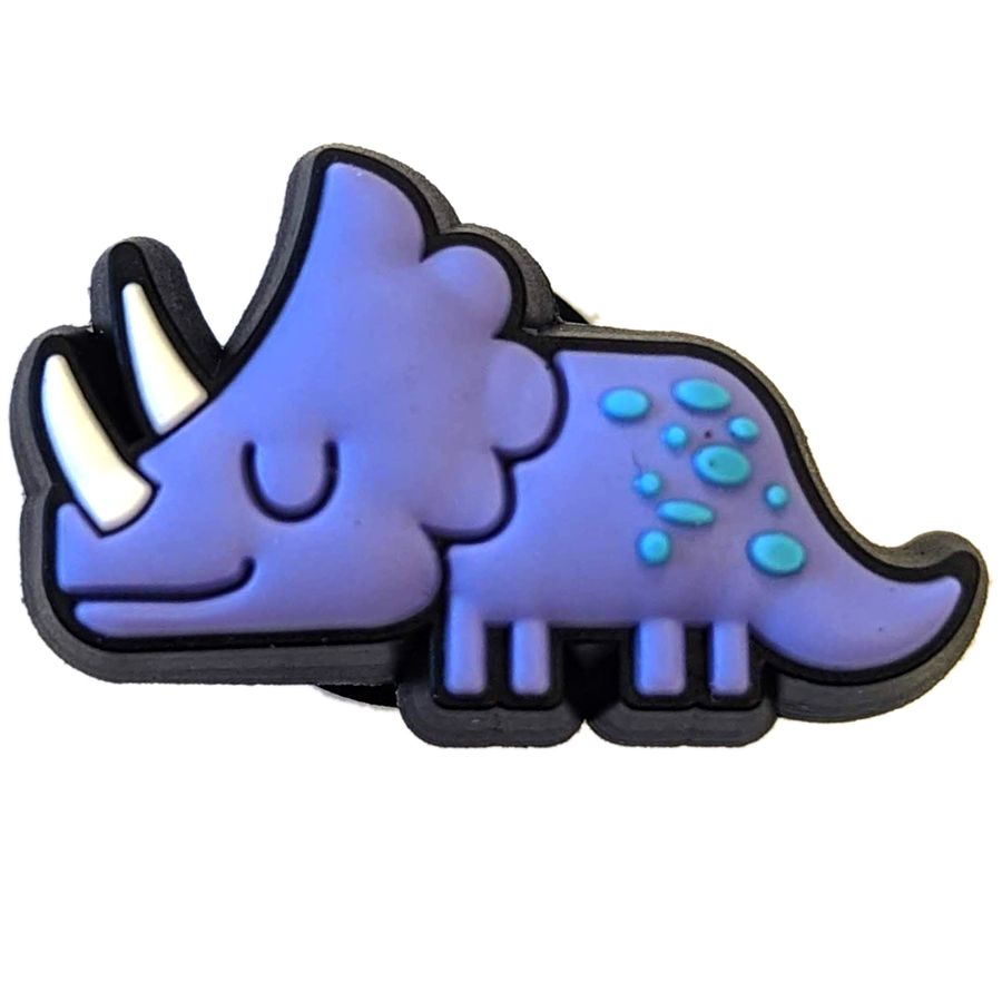 Detailansicht von lila CROCS Jibbitz DINOSAURIER, ein lustiger Schuhanhänger in Form eines Dinosauriers für Kinder-Crocs