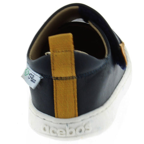 Child wearing ACEBO'S Barfuß Halbschuh 1376 VE - navy / zimt shoe while walking on a playground, demonstrating durability and support