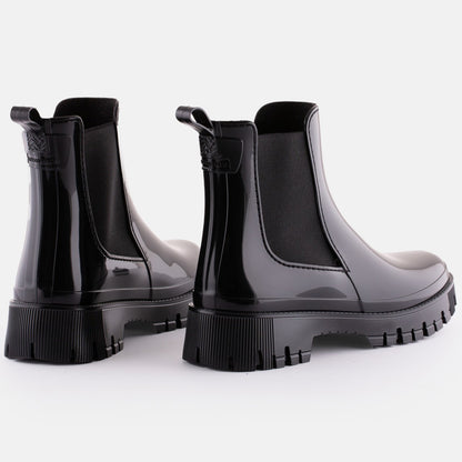 Schwarze Gummistiefel für Kinder mit robustem Außenmaterial aus Gummi und komfortablem Innenfutter