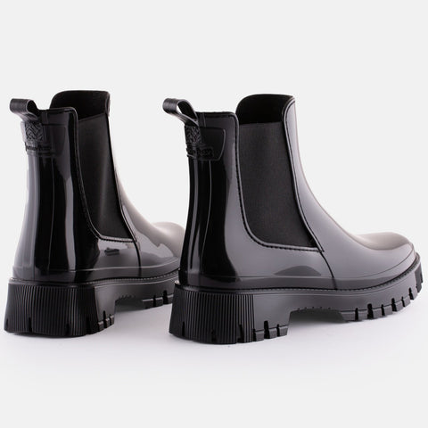 Schwarze Gummistiefel für Kinder mit robustem Außenmaterial aus Gummi und komfortablem Innenfutter