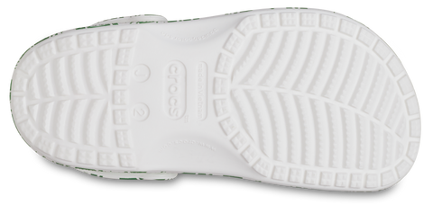 A pair of CROCS KIDS’ CLASSIC DUKE PRINT CLOG 210007-3WH in white and green colors, featuring a playful and fun design for children