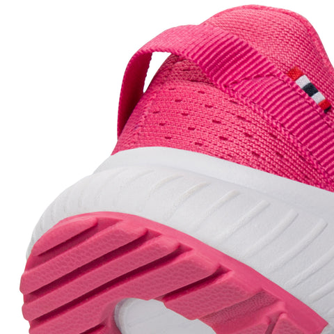 Person wearing the VIKING Halbschuh AERY BREEZE - magenta while hiking outdoors