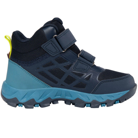 Close-up of VIKING TEX Knöchelschuh TRACK MID WP 2V - navy / ocean hiking shoes being worn on a forest trail