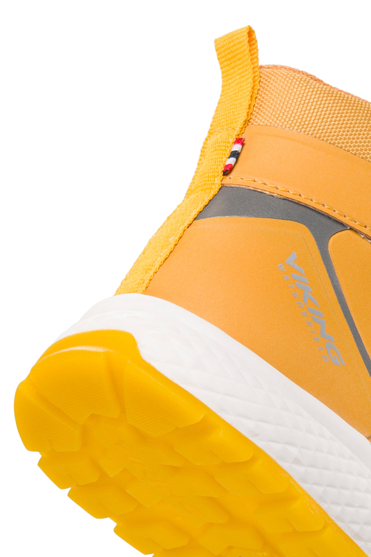 Seitenansicht des wasserdichten Knöchelschuhs mit reflektierenden Elementen in Curry und Gelb