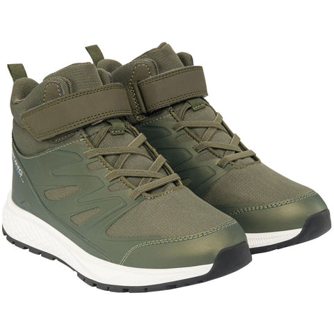 Pair of VIKING TEX Knöchelschuh EQUIP MID WP 1V - oliv boots on rocky terrain with hiker in the background