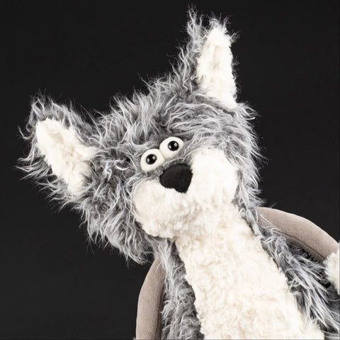 Vorderansicht des Sigikid BEASTS Copy Cat Stofftiers, grau-weißes Fell, weiße Schnauze, große schwarze Augen.