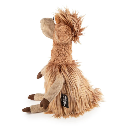 Seitenansicht eines SIGIKID BEASTS Sabber Lina Stofftier aus braunem Flauschfell, sichtbares Logo-Tag.
