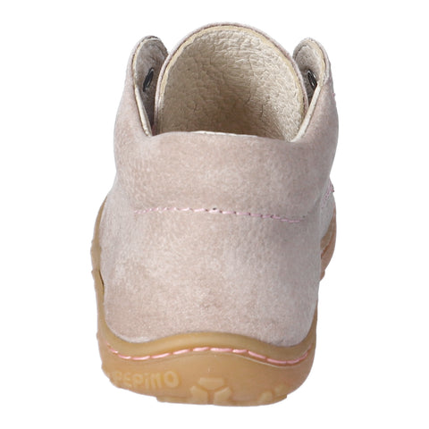 Child wearing RICOSTA Knöchelschuh CORY - kies / rosa while playing outdoors, showcasing its versatility