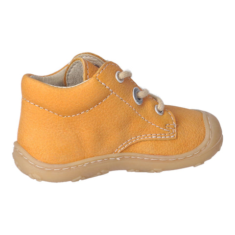 A close-up image of the RICOSTA Knöchelschuh CORY in curry color, showing its durable leather material and sturdy rubber sole for comfortable and stylish wear