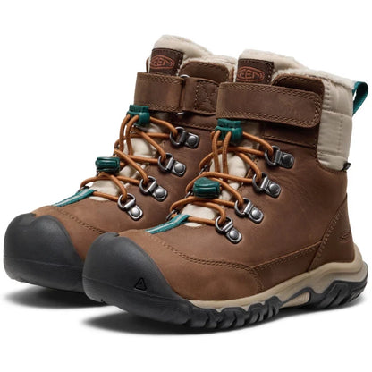 Sicherer Halt für Kinder mit KEEN KANIBOU Gummistiefeln in braun und petrol, ideal für Regenwetter