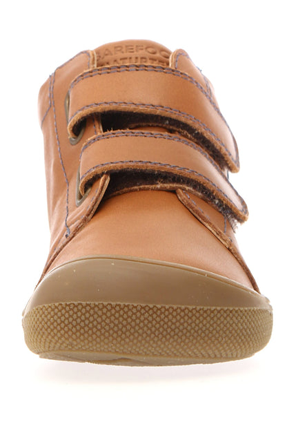 Seitenansicht des NATURINO GIMBA Knöchelschuhs in cognac und blau, der optimalen Halt und Komfort bietet