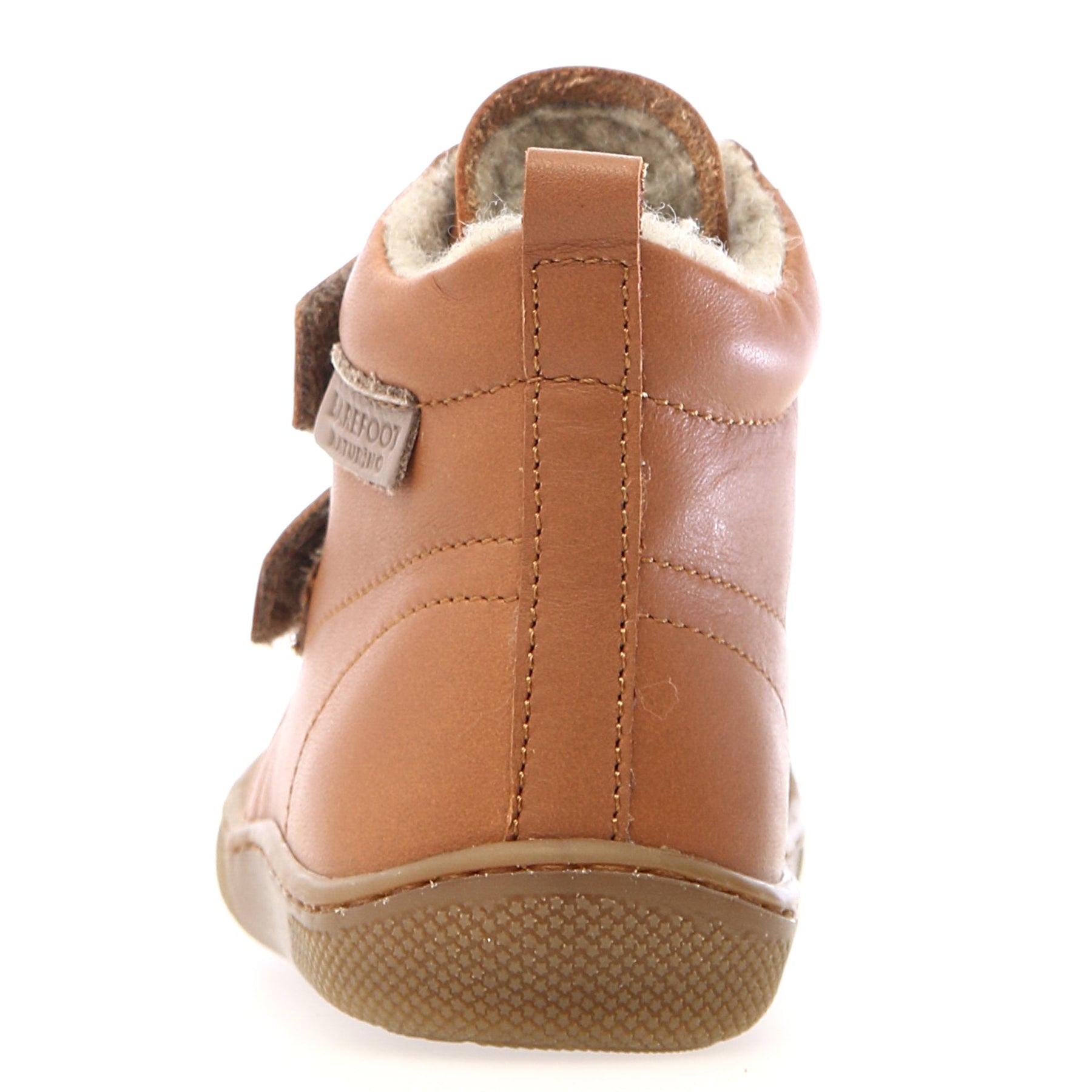 Blick auf die flexible, rutschfeste Sohle des NATURINO Barfuß Stiefels WIGGHI in Cognac