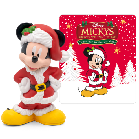 Micky Mouse in winterlicher Weihnachtskulisse mit festlicher Dekoration