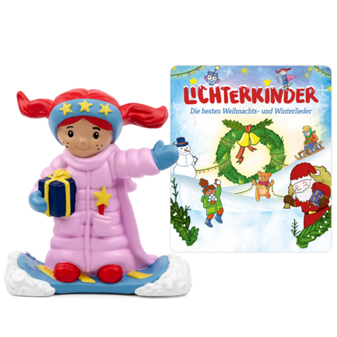 TONIES Figur - Lichterkinder - Die besten Weihnachts-und Winterlieder figur playing a Christmas song in a cozy living room setting with snow falling outside