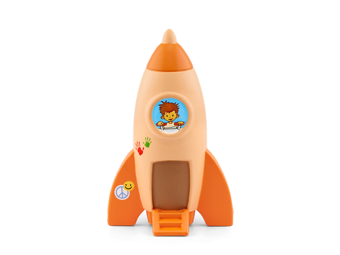 Vorderansicht einer orange TONIES-Tonie-Figur Toto und der Mann im Mond als Rakete, blaues Fensterbild eines Jungen.