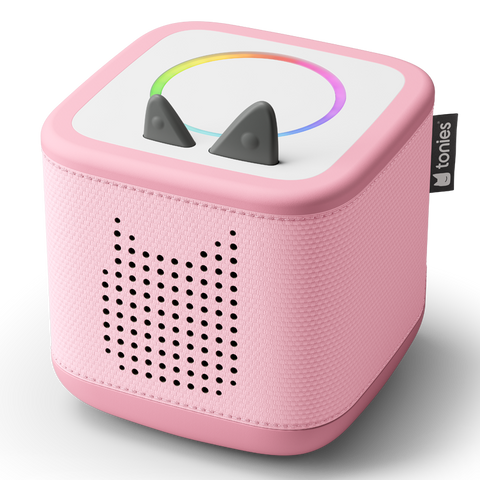 Vorderansicht: pinke TONIES Toniebox 2; weißer Deckel, Regenbogenring, Lautsprecherfront sichtbar.