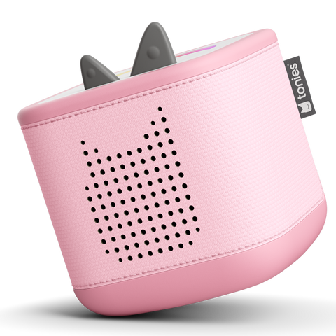 TONIES Toniebox 2 rosa, Dreiviertelansicht: graue Tonie-Ears, pinkes Gehäuse, Seitenetikett TONIES sichtbar.