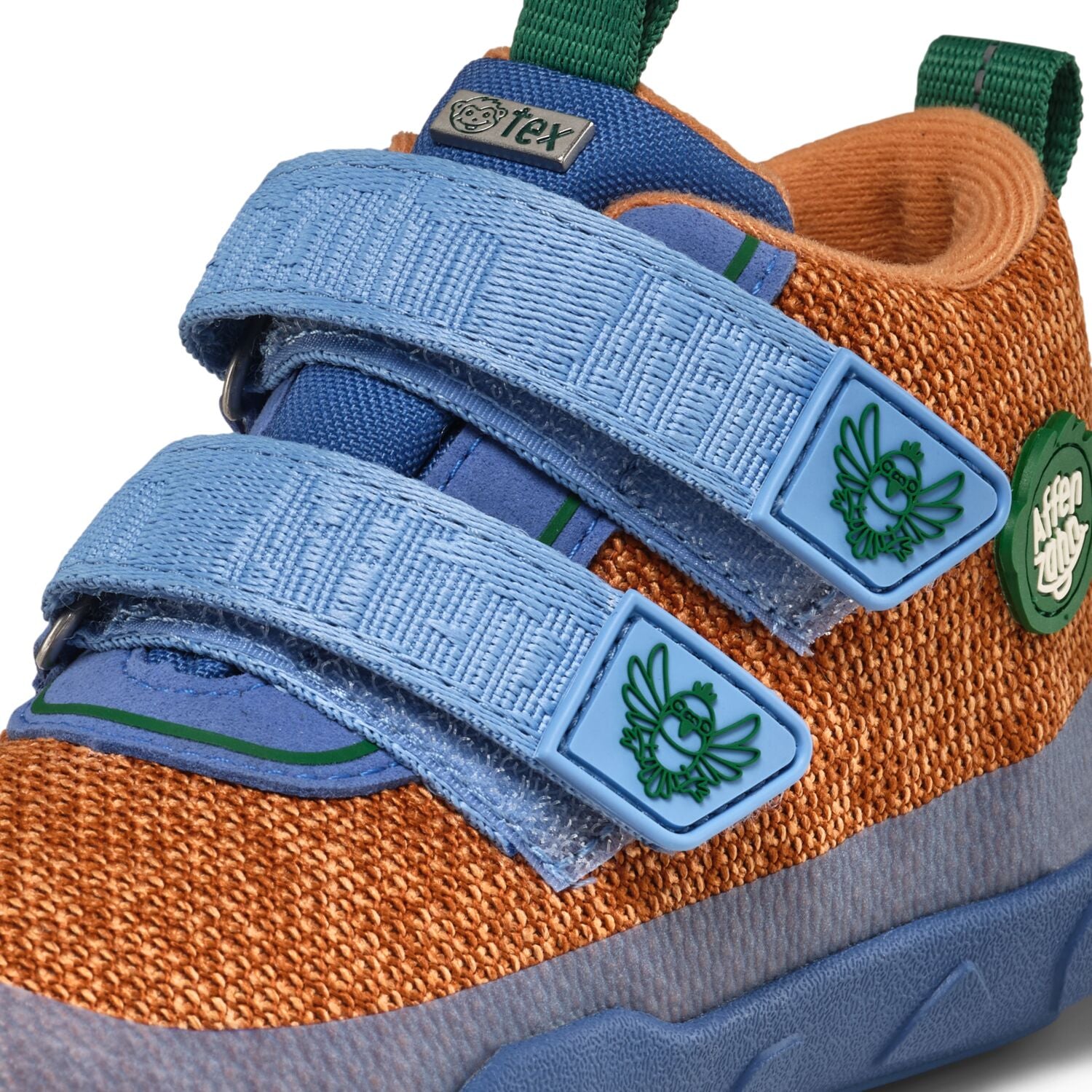 Colorful AFFENZAHN TEX Knöchelschuh KNIT HAPPY PARADIESVOGEL in zimt, blau, and grün featuring a playful parrot design and cozy knit material for comfortable, stylish toddler footwear