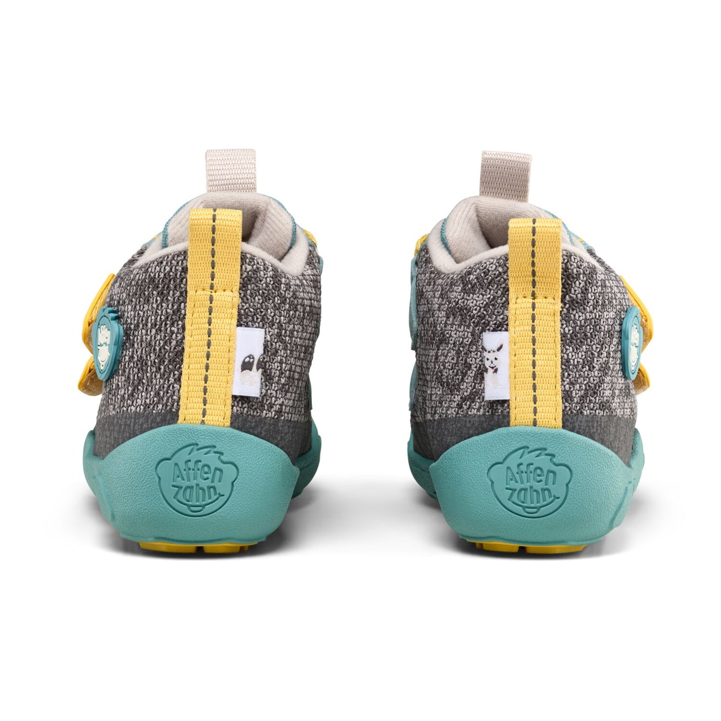 Kuscheliger Knöchelschuh aus weichem Stoff in Grau, Gelb und Türkis mit Nashorn-Design