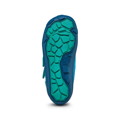 Bequemer veganer Stiefel in türkis mit auffälligem Tiermuster und weicher Sohle