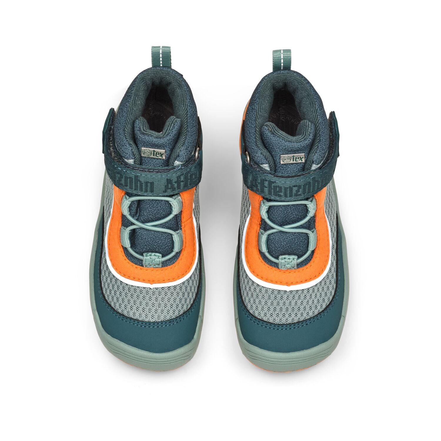 Nahaufnahme der Sohle des veganen AFFENZAHN TEX Knöchelschuhs in petrol und orange, zeigt das Profil