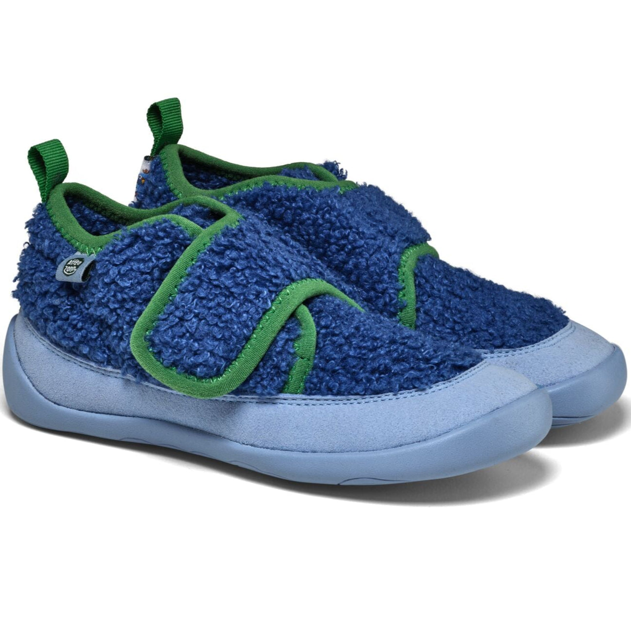 Stylischer AFFENZAHN Hausschuh VEGAN FLEECY mit tierfreiem Material und farbenfrohem Vogel Design