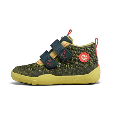 Seitenansicht des AFFENZAHN Sneaker KNIT HAPPY RAUPE in petrol/neongrün mit gelber Sohle