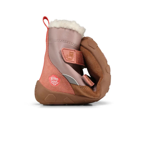 Seitenansicht des AFFENZAHN TEX Stiefels WINTY PONY in Braun/Rosa mit Fellrand, Klettverschluss und brauner Sohle