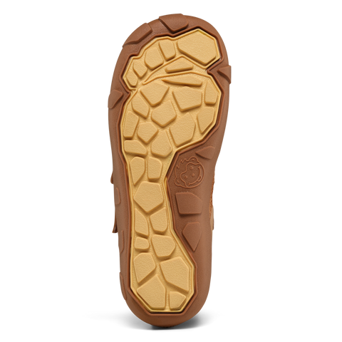 Unteransicht des AFFENZAHN TEX Knöchelschuh FRIENDY TIGER; gelbe Sohle mit grobem Profil, braune Umrandung, Logo-Pfote sichtbar.