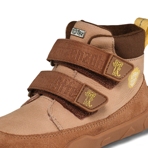 Seitenansicht eines braunen AFFENZAHN TEX Knöchelschuhs mit zwei Velcro-Bändern und goldenen Tiger-Logos