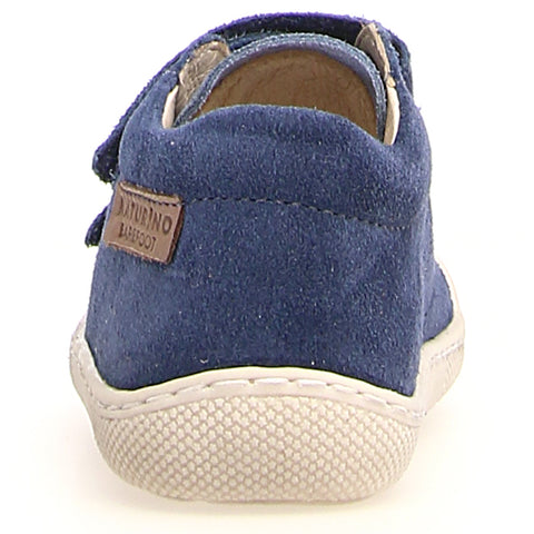 Child wearing NATURINO Barfußschuh Halbschuh AMUR while playing outside