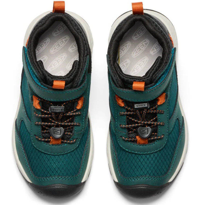 Sohle des KEEN SKUA MID mit rutschfester Profilierung in Tanne und Orange