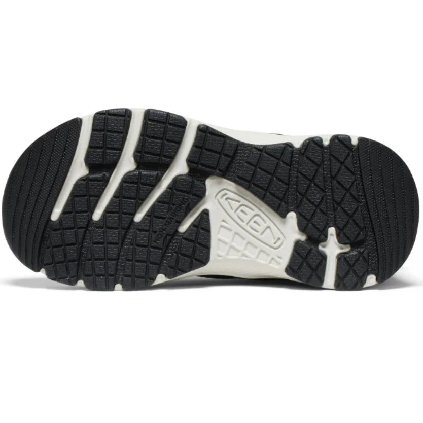 Seitenansicht des KEEN SKUA MID Wanderschuhs in Tanne und Orange mit stabilem Knöchelbereich