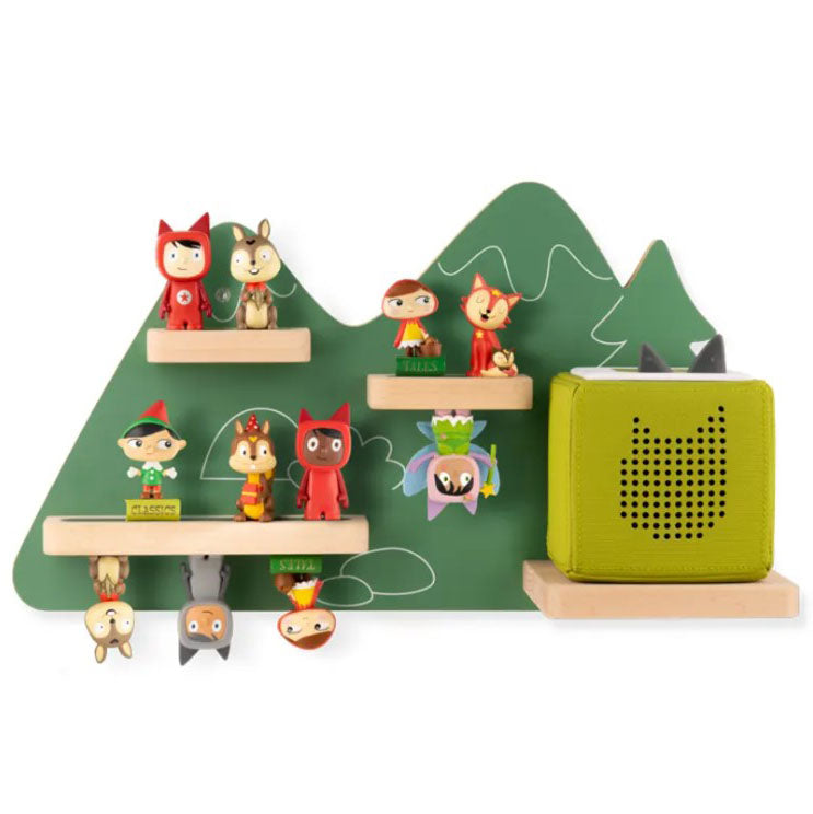 TONIES Wandregal Auf zum magischen Berg showcasing a white, wall-mounted shelf with colorful and playful design, ideal for storing and displaying Tonies audio characters and their accompanying story content 