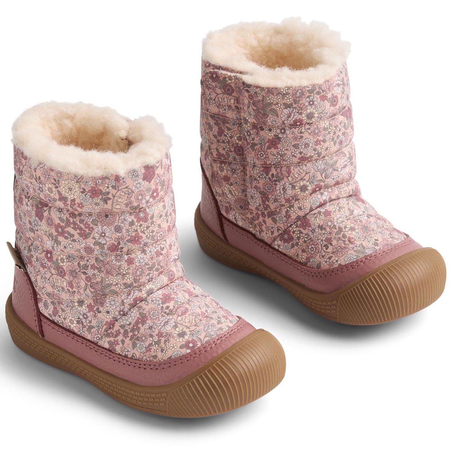 Detaillierte Nahaufnahme des warm gefütterten WHEAT TEX DELANEY Stiefels in winterblumendesign und altrosa Farbe