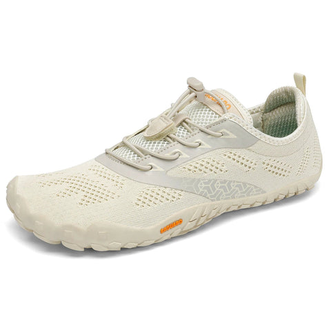 Seitenansicht des SAGUARO Barfußschuh SMART in créme/beige; Mesh-Obermaterial, Schnürung, orange SAGUARO-Logo am Seitenteil.
