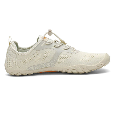 Seitenansicht des SAGUARO Barfußschuh SMART in créme/beige; Mesh-Obermaterial, leicht profilierte Sohle.