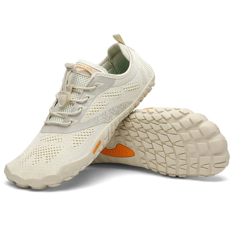 Seitenansicht des SAGUARO Barfußschuh SMART, creme/beige; Mesh-Obermaterial, Schnürung, orange SAGUARO-Logo an der Sohle.