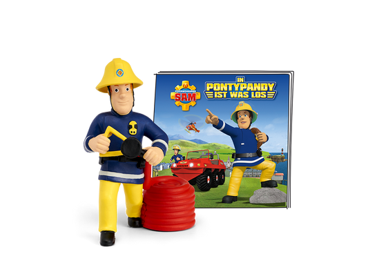 Feuerwehrmann Sam in Pontypandy mit seinem Feuerwehrauto auf dem Weg zum Einsatz