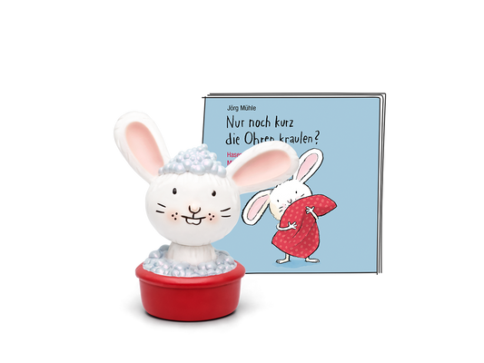 A cute TONIES figurine of a bunny child, with the title Nur noch kurz die Ohren kraulen?
