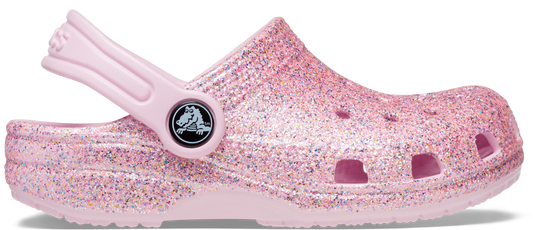 A close-up image of the CROCS CLASSIC GLITTER CLOG 206992-1DG in pink color, featuring a sparkling glitter design for a stylish and comfortable footwear option