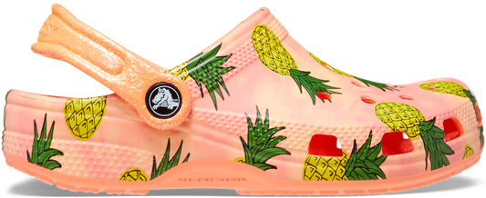 A vibrant papaya-colored CROCS CLASSIC POOL PARTY CLOG 207826-83E featuring ananas design