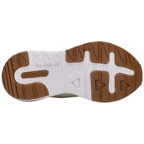  A person wearing VIKING Halbschuh AERY SOL LOW - crémeweiss while hiking in the mountains 