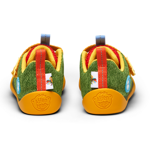 Colorful green, mustard, and red AFFENZAHN Barfuß Halbschuh KNIT HAPPY PARADIESVOGEL - a fun and vibrant shoe perfect for kids