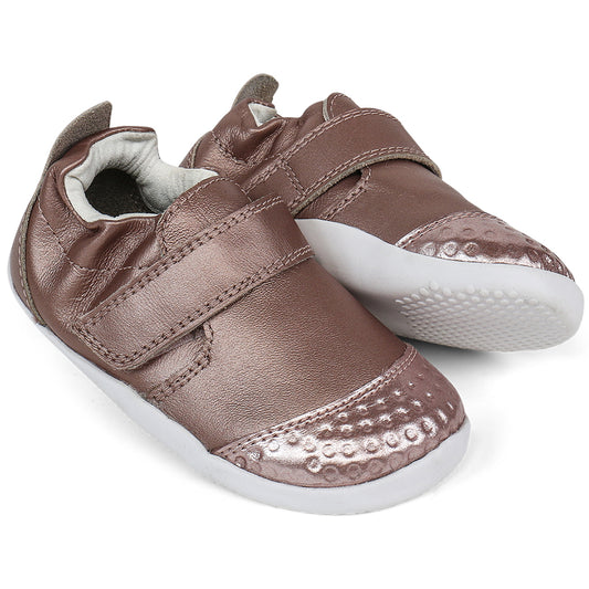 A close-up image of the BOBUX PreWalker XP GO 501015B in roségold, showcasing its stylish design and durable construction for young toddlers learning to walk