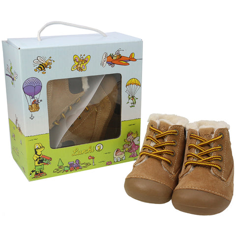Child playing outdoors in the LURCHI PreWalker FERDI gefüttert 13977-27 - camel shoe, demonstrating its comfort and stability on different surfaces