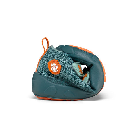 Side view of AFFENZAHN TEX Knöchelschuh HAPPY HASE - petrol - orange shoe on a child's foot