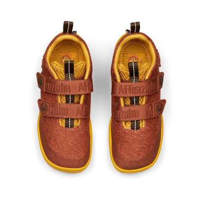 Red-brown and yellow AFFENZAHN Barfuß Halbschuh KNIT HAPPY LÖWE with lion design, perfect for barefoot adventures